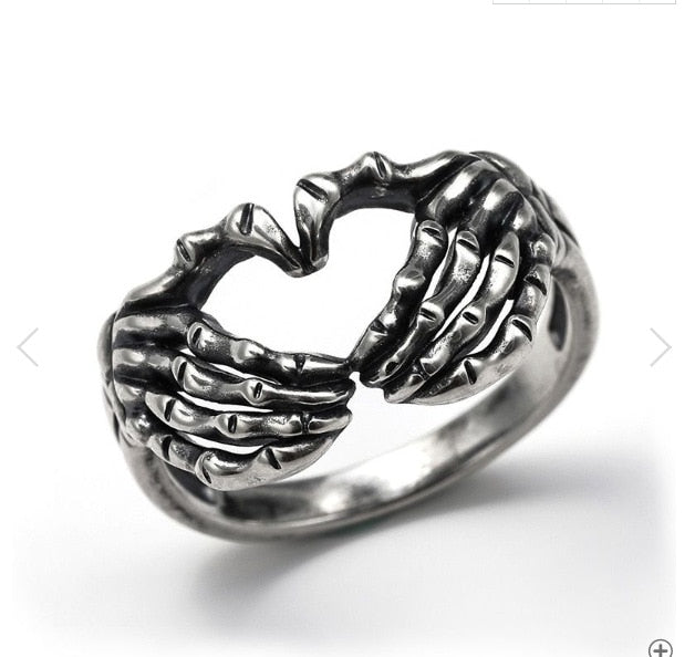Stainless Steel Retro Skull Hand With Heart Ring —
