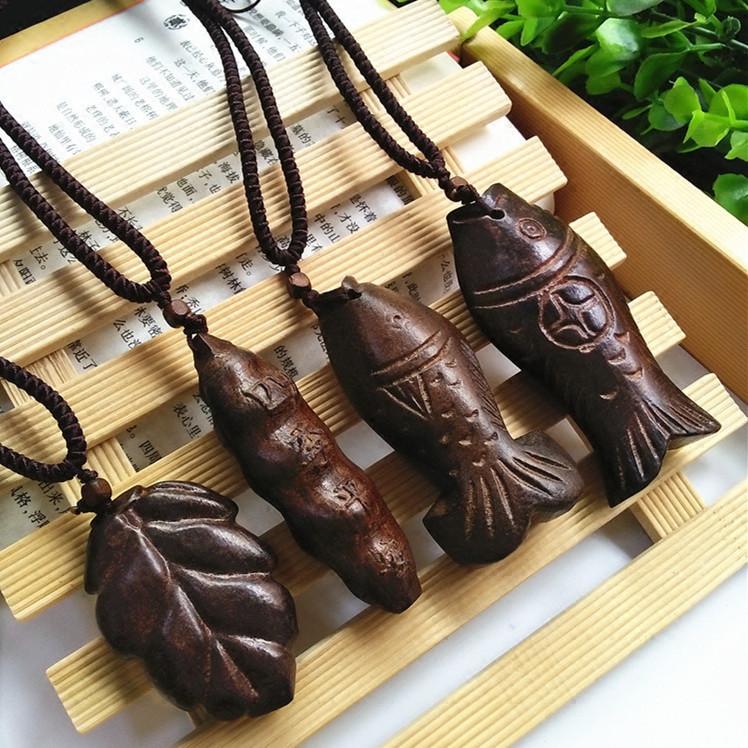 Long Wooden Fish Necklace —